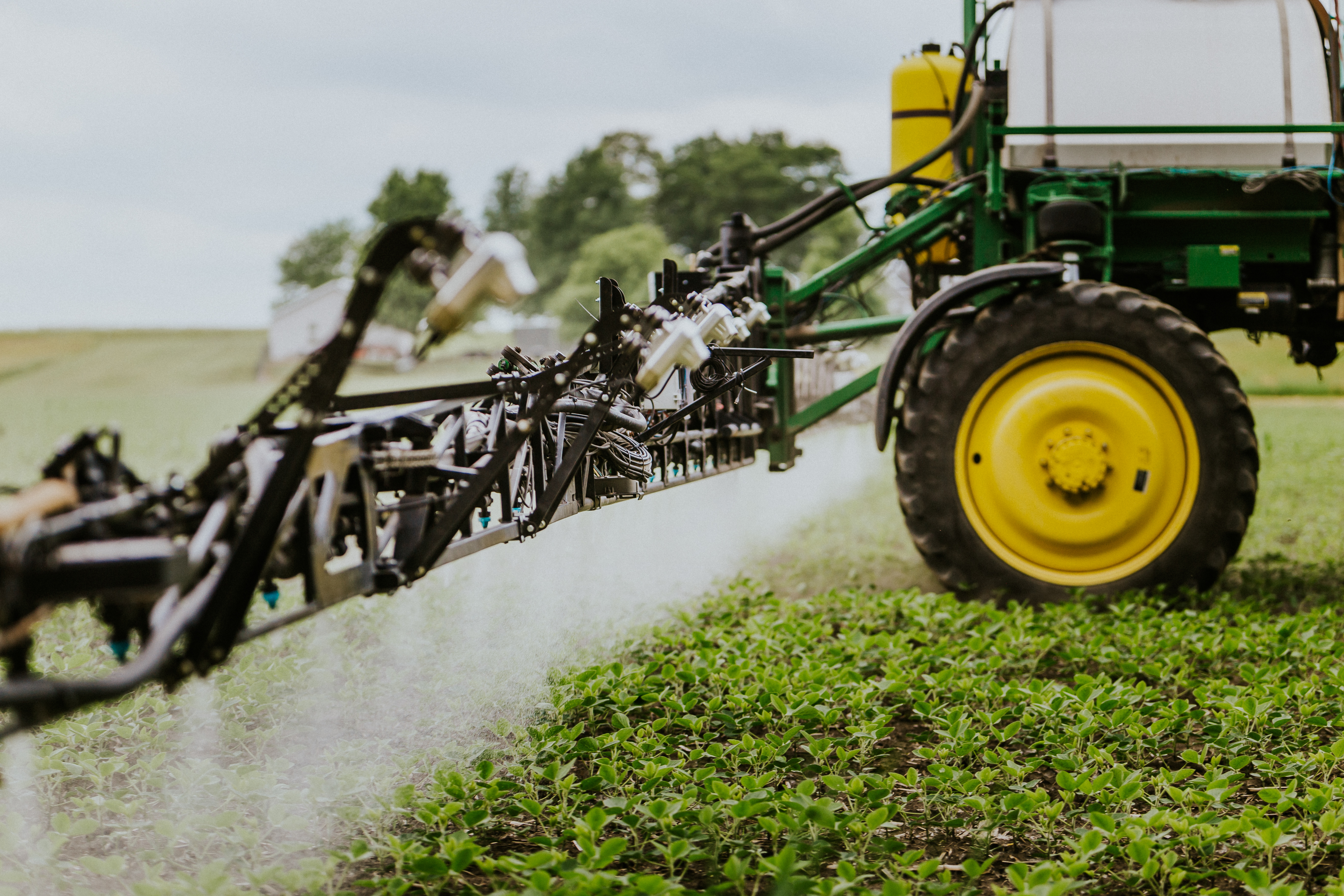 Close up image of a sprayer beam applying weed control
